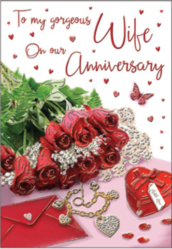 A richly romantic anniversary card scene spreads across the frame, composed with the sensitivity and detail of an experienced florist from Flowers Erith. At its centre lies a gathering of red roses, each bloom dense with velvety petals that curl outward in plush spirals, creating a sense of abundance and warmth. The roses are bright yet deep in tone, their rich crimson colour offset by pockets of fresh greenery, where slender stems and leaves peek through, adding life and texture. The flowers seem to rest on or slightly over an envelope, the paper smooth, pale, and inviting, hinting at a personal message handwritten for a loved one in a quiet home somewhere near Erith town centre. Just beside this, a heart-shaped keepsake box lends a sense of intimacy, its polished surface catching delicate highlights that suggest a precious interior, perhaps holding rings, charms, or tiny memories of shared milestones. Nearby, a piece of jewellery is laid out with care, a fine chain or bracelet catching glimmers of reflected light, its gentle curve echoing the soft lines of the roses' stems. Scattered across the scene are small heart decorations and sparkling accents, like festive confetti that has settled after a joyful celebration. A single butterfly motif appears to flutter across the composition, symbolising transformation, renewal, and the lightness that can still be found in long-lasting love. The entire arrangement is bathed in soft, even lighting, producing mild shadows and delicate highlights that enhance the tactile quality of petals, paper, and metallic surfaces. Tones of ruby red, creamy white, blush pink, and warm gold harmonise to create an atmosphere of tender, enduring romance, perfectly suited to marking an anniversary in Erith.