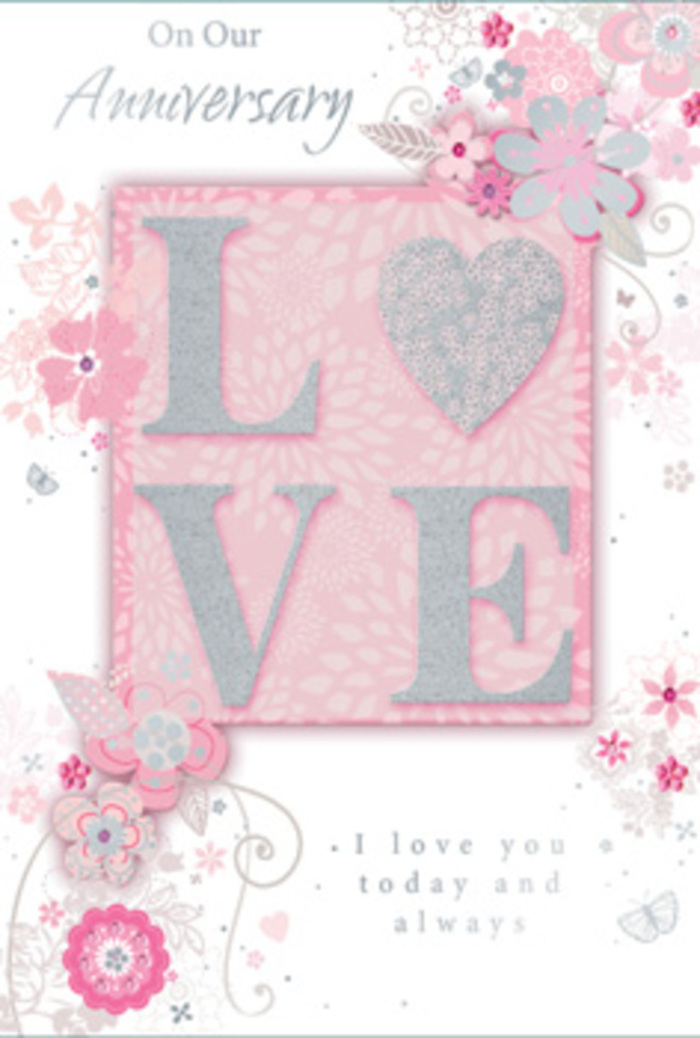 This anniversary card is shown in close view, inviting the eye to linger over its details the way one might pause over a finely arranged bouquet from Flowers Erith. Dominating the centre is the word LOVE, its letters raised and coated with a velvety glitter that appears both soft and luminous. The colour of the lettering blends blush pink with pearlescent highlights, while slender lines of silver glitter trace the edges, giving the impression of moonlight catching the rim of a glass vase filled with flowers. Flanking and surrounding this focal word, wispy, hand-drawn blooms and airy sprays of foliage drift along the card's borders. The flowers are delicate and stylised, with petals in pale pink, lilac-tinged blush and creamy ivory, their outlines gently sketched as if by a florist planning a romantic, pastel-toned arrangement for an anniversary delivery in Erith. Fine filigree lines curl between the blooms, forming loops and tendrils that resemble the natural curve of stems. Among these are dainty leaves and subtle, almost-hidden butterfly motifs, adding a sense of fluttering lightness and quiet joy. The background is a soft, even pink that supports the design without competing with it, allowing each glittering stroke and fine line to remain clearly visible. Set within this floral reverie, the message I love you today and always appears in an understated, elegant typeface, the words gently spaced to invite a moment of reflection. The overall impression is that of a carefully considered tribute to lasting affection, perfectly matched to the mood of an anniversary evening in Erith, perhaps shared over flowers and candlelight.